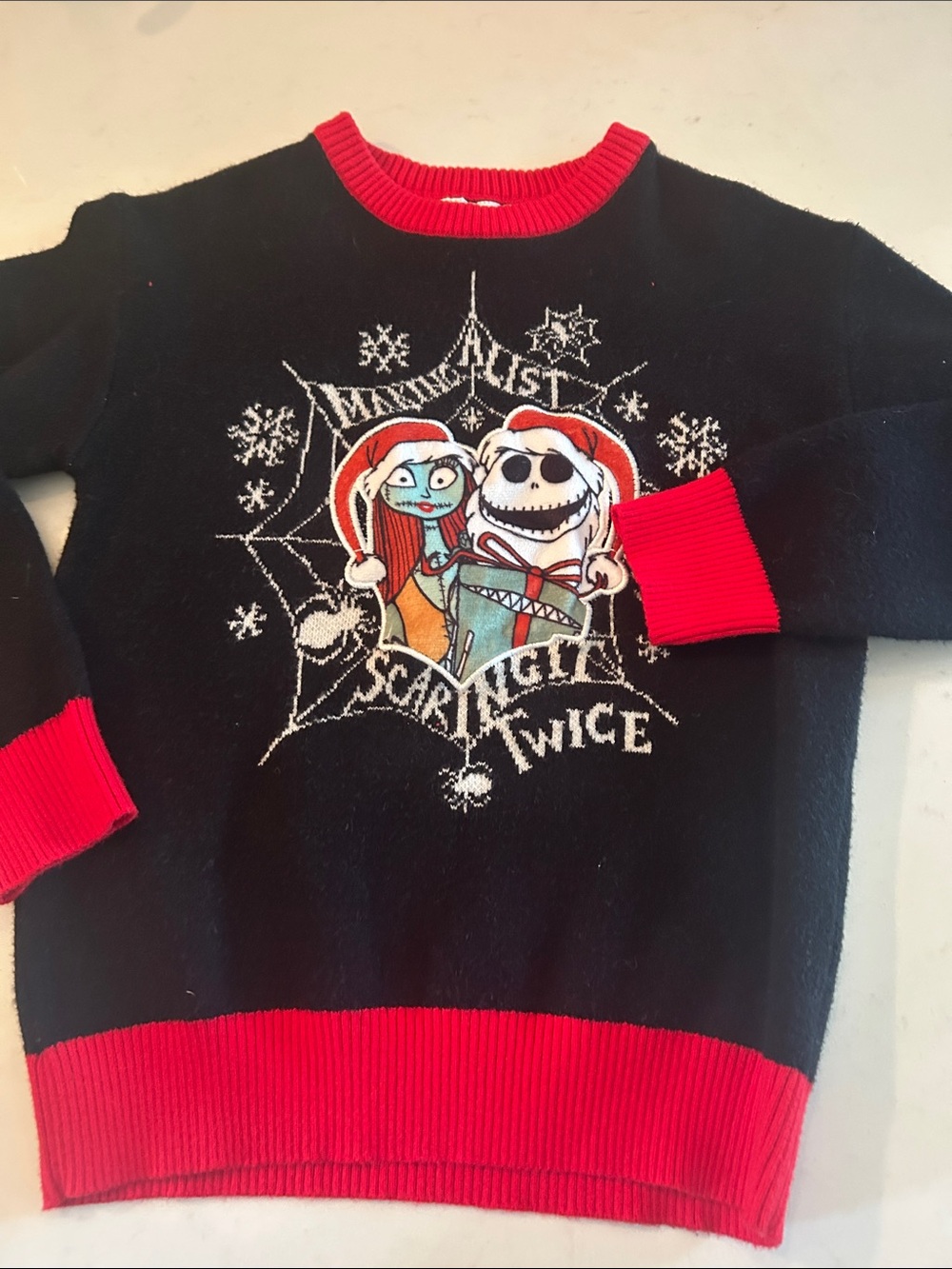 Disney Men’s Black Crewneck Sweater with Red Trim and Jack Skellington Graphic